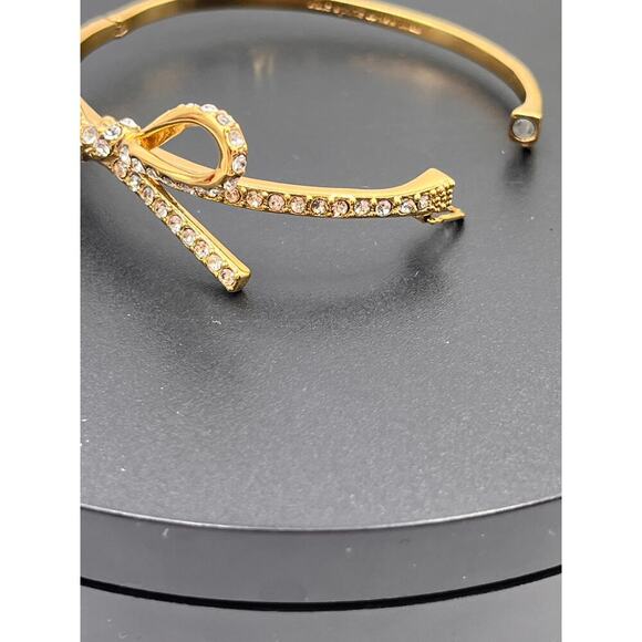 Kate Spade NY Skinny Mini Pave Bow
Gold Plated Hinged Bangle Feminine Bracelet - Picture 8 of 9